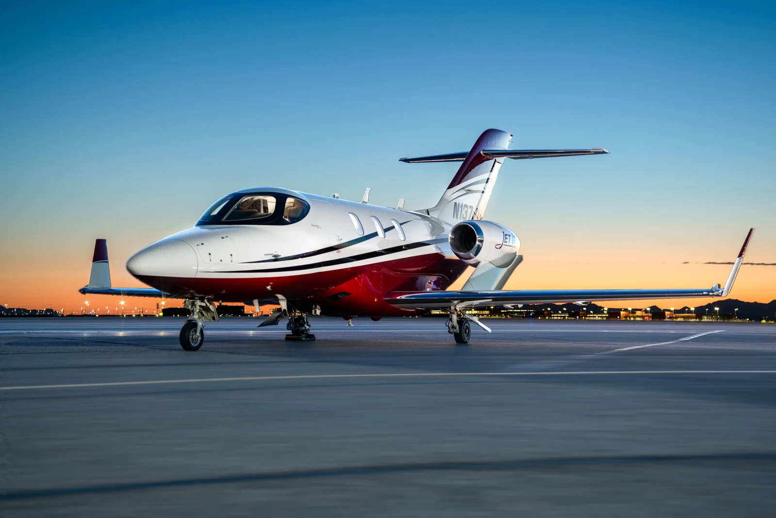 Private jet on the ramp at sunset